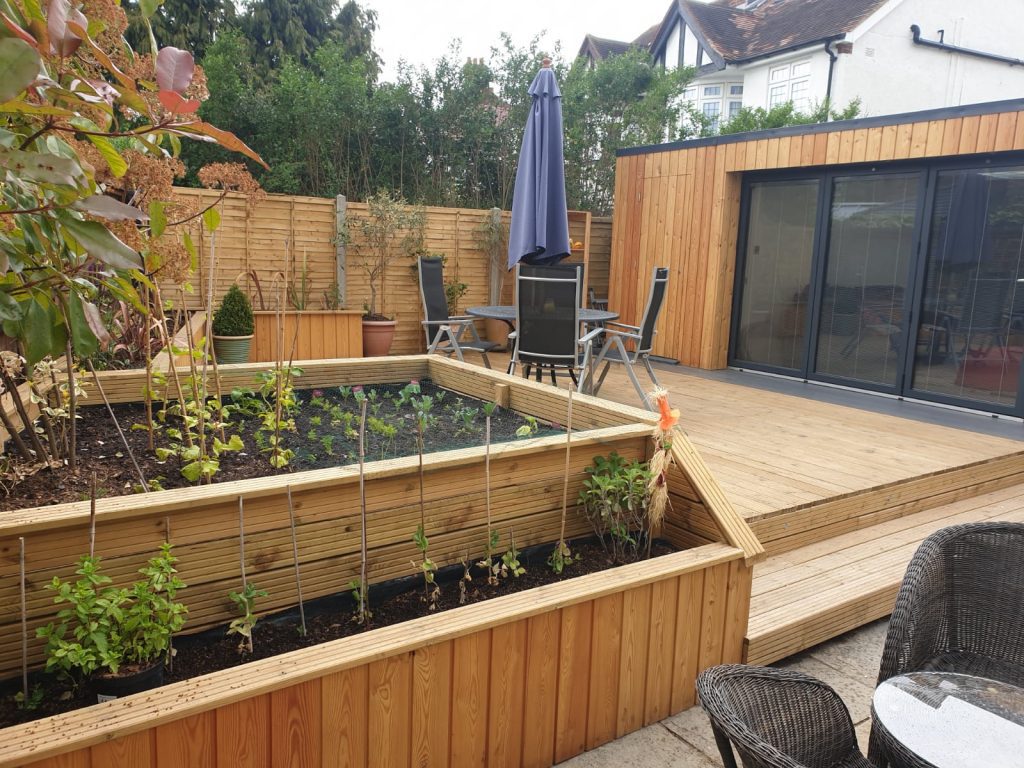 Finished wooden decking serving as a stylish outdoor terrace.